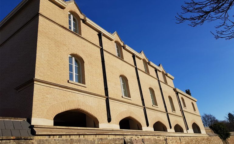 Structural brick window arches, created by Apex BrickCutters, at Peterhouse College.