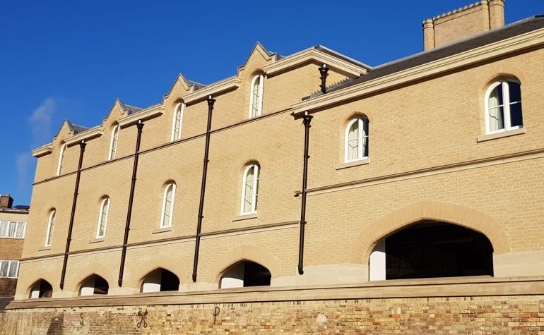 Structural brick window arches, created by Apex BrickCutters, at Peterhouse College.