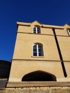 An example of structural brick window arches, created by Apex BrickCutters, at Peterhouse College.