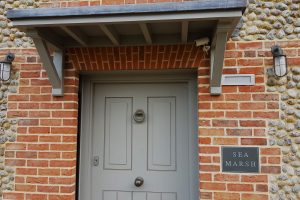 An example of an Apex BrickCutters brick arch over the doorway of a Norfolk house.
