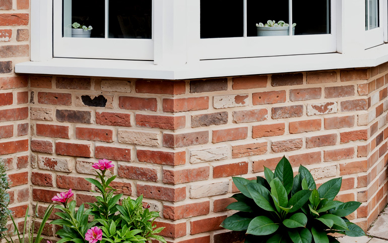 An example of specially shaped bricks, manufactured from standard bricks, using a cut and bonded method.