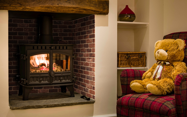 Apex Brick Slips make a great rustic and durable surround for your home's log burner